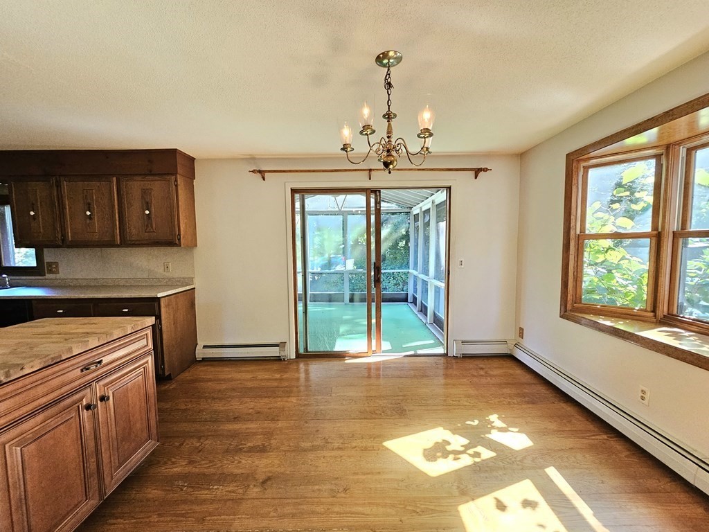 47 Stagecoach Road Amherst, MA 01002 - Photo 8 of 38 a view of a kitchen with a sink and windows