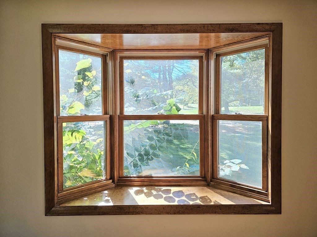 47 Stagecoach Road Amherst, MA 01002 - Photo 10 of 38 a view of a room that has a large window