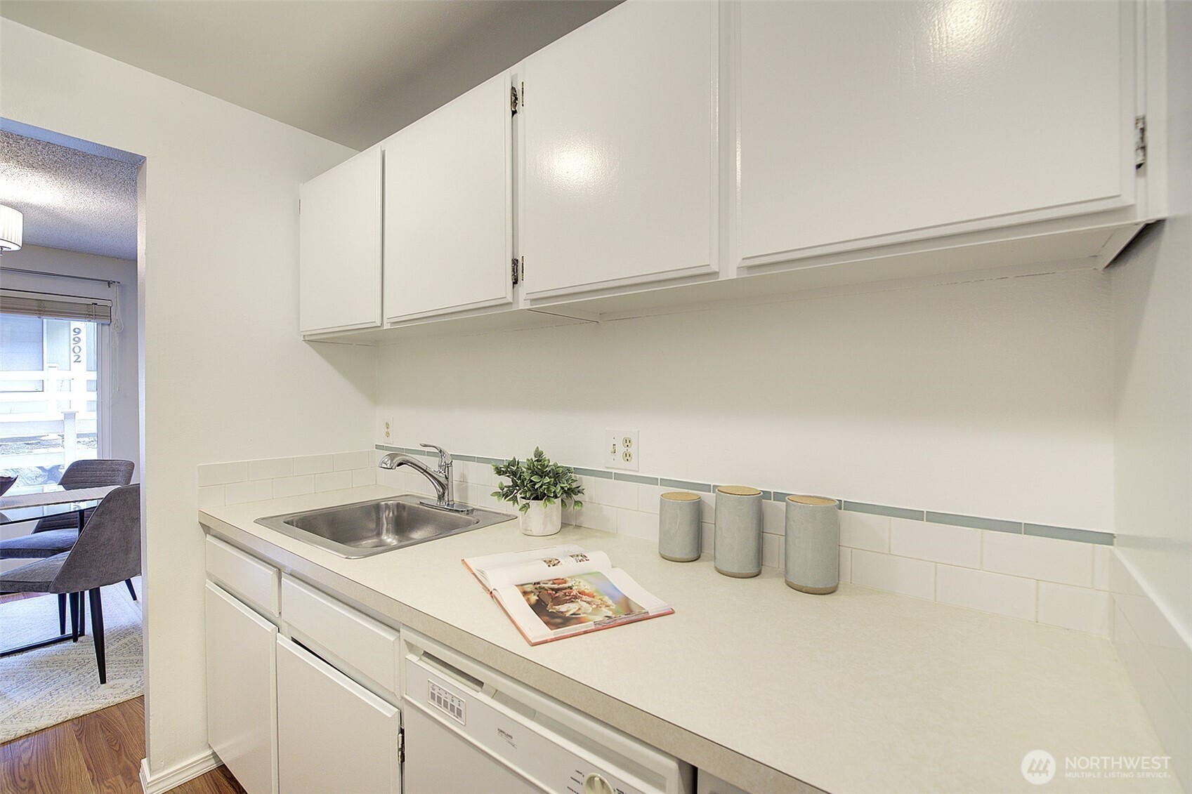 9900 Northeast 124th Street, Unit 1315 Kirkland, WA 98034 - Photo 11 of 20 a kitchen with a sink and cabinets