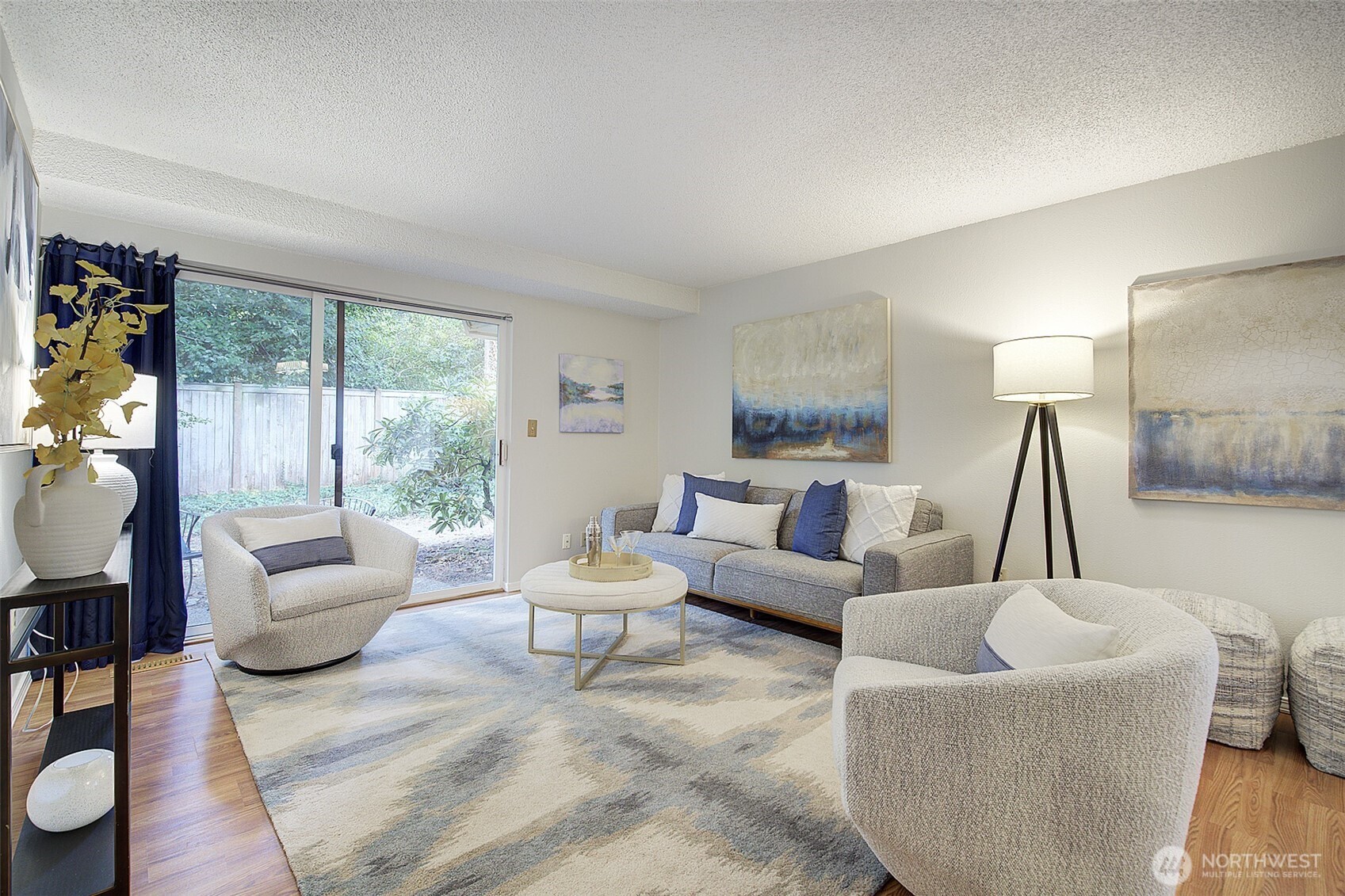9900 Northeast 124th Street, Unit 1315 Kirkland, WA 98034 - Photo 5 of 20 a living room with furniture and a large window