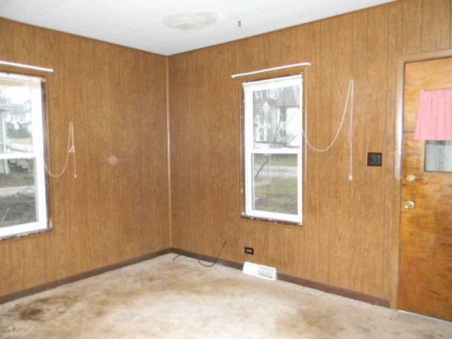 205 West Henry Street Odell, IL 60460 - Photo 3 of 10 a view of an empty room with a window