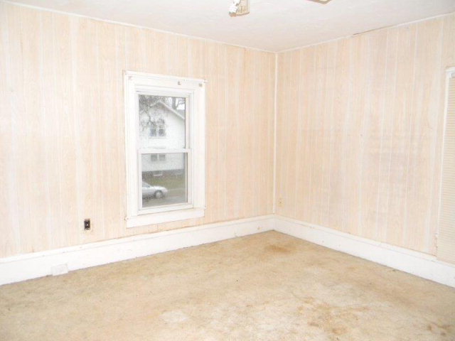 205 West Henry Street Odell, IL 60460 - Photo 8 of 10 a view of an empty room with a window