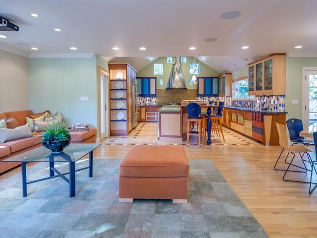 45 Clark Drive San Mateo, CA 94401 - Photo 11 of 49 a living room with furniture and a dining table with kitchen view