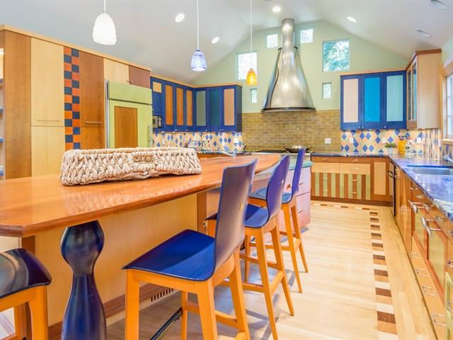 45 Clark Drive San Mateo, CA 94401 - Photo 13 of 49 a kitchen with a sink and chairs