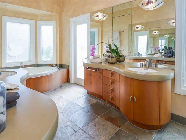 45 Clark Drive San Mateo, CA 94401 - Photo 20 of 49 a bathroom with a tub sink and mirror