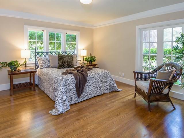 45 Clark Drive San Mateo, CA 94401 - Photo 24 of 49 a bedroom with a bed chair and a large window