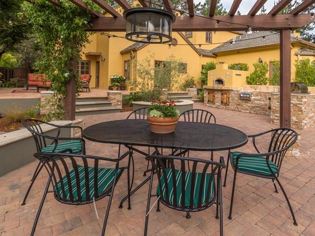 45 Clark Drive San Mateo, CA 94401 - Photo 43 of 49 a view of a patio with a table and chairs