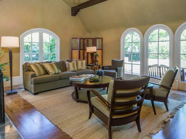 45 Clark Drive San Mateo, CA 94401 - Photo 5 of 49 a living room with furniture a table and a large window