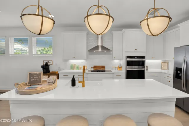 a spacious bedroom with a bed and a couch