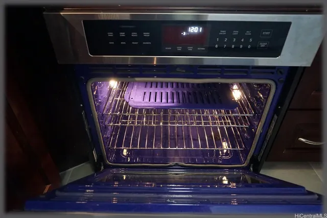 a view of a room that has a large window