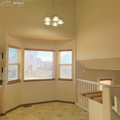 11191 Berry Farm Road Fountain, CO 80817 - Photo 3 of 21 Eat In Nook w/ Built in Storage Bar