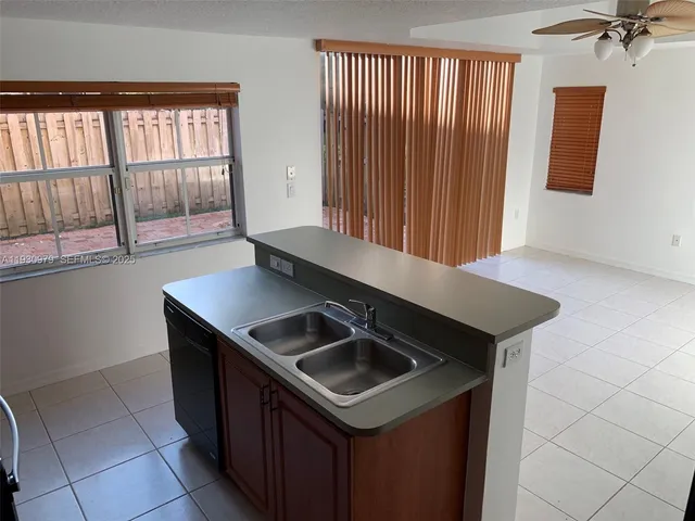 a view of a garden from a balcony