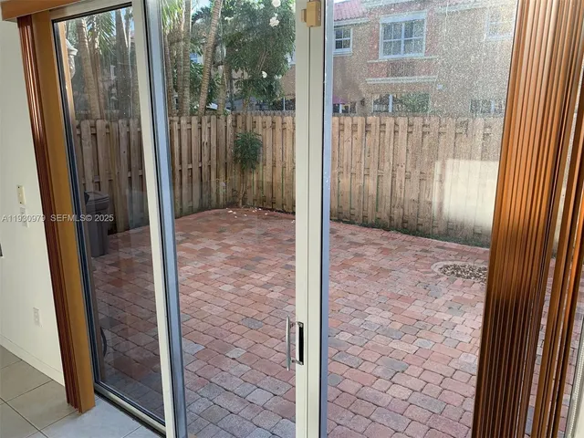 a view of a wooden fence