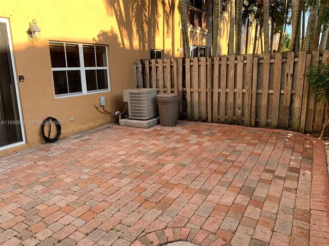 a view of a garden from a terrace