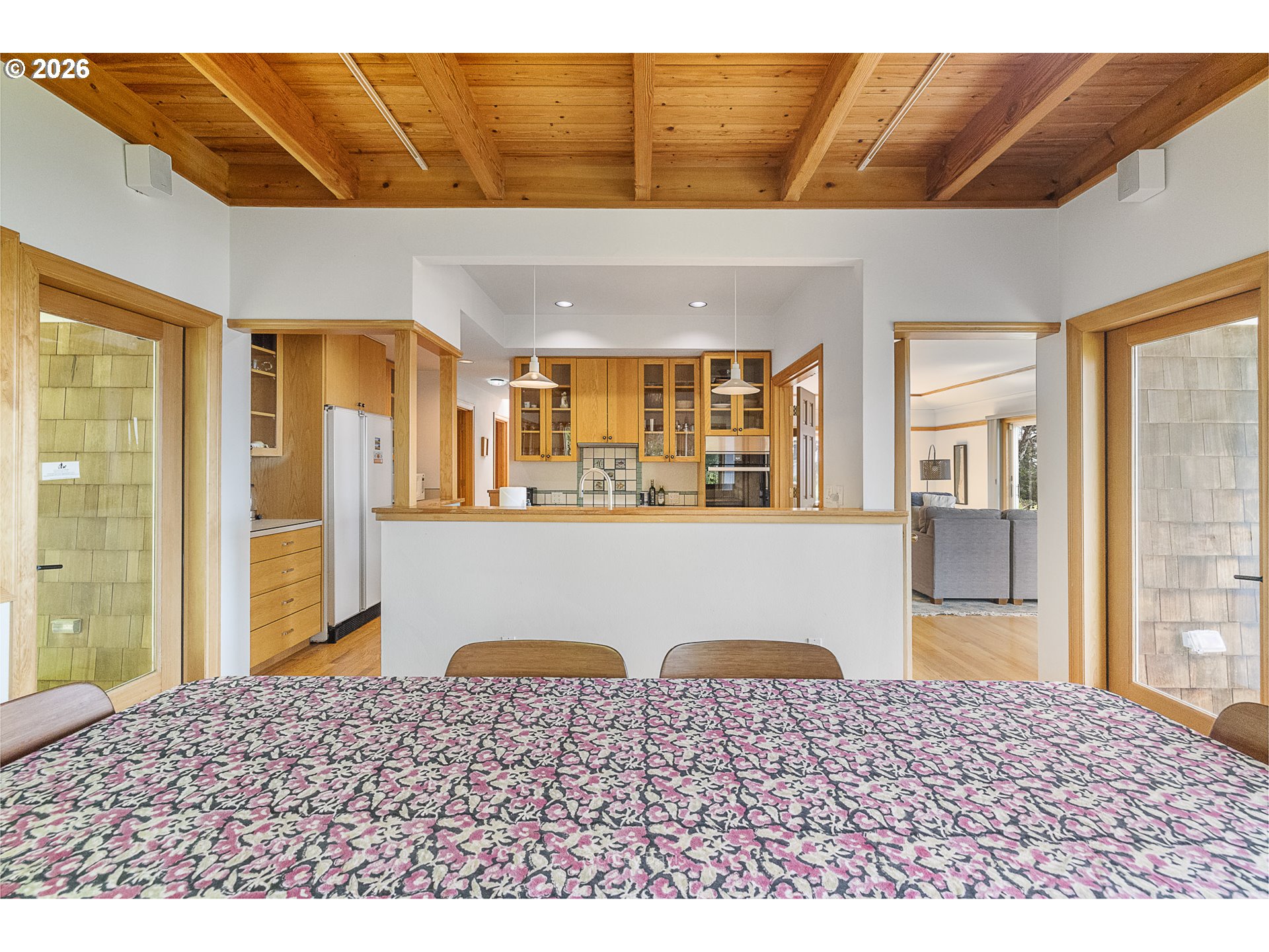 38295 Beulah Reed Road Nehalem, OR 97131 - Photo 21 of 42 a bedroom with a bed and wooden floor