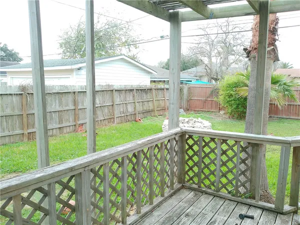 a view of backyard with green space
