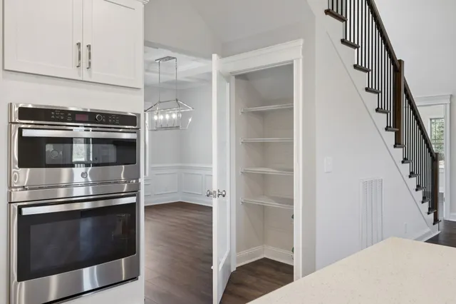 a bathroom with a shower and toilet