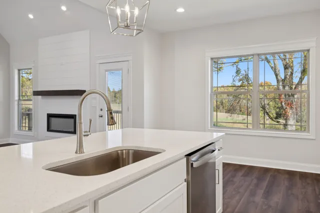 a bathroom with a sink a toilet and a bathtub