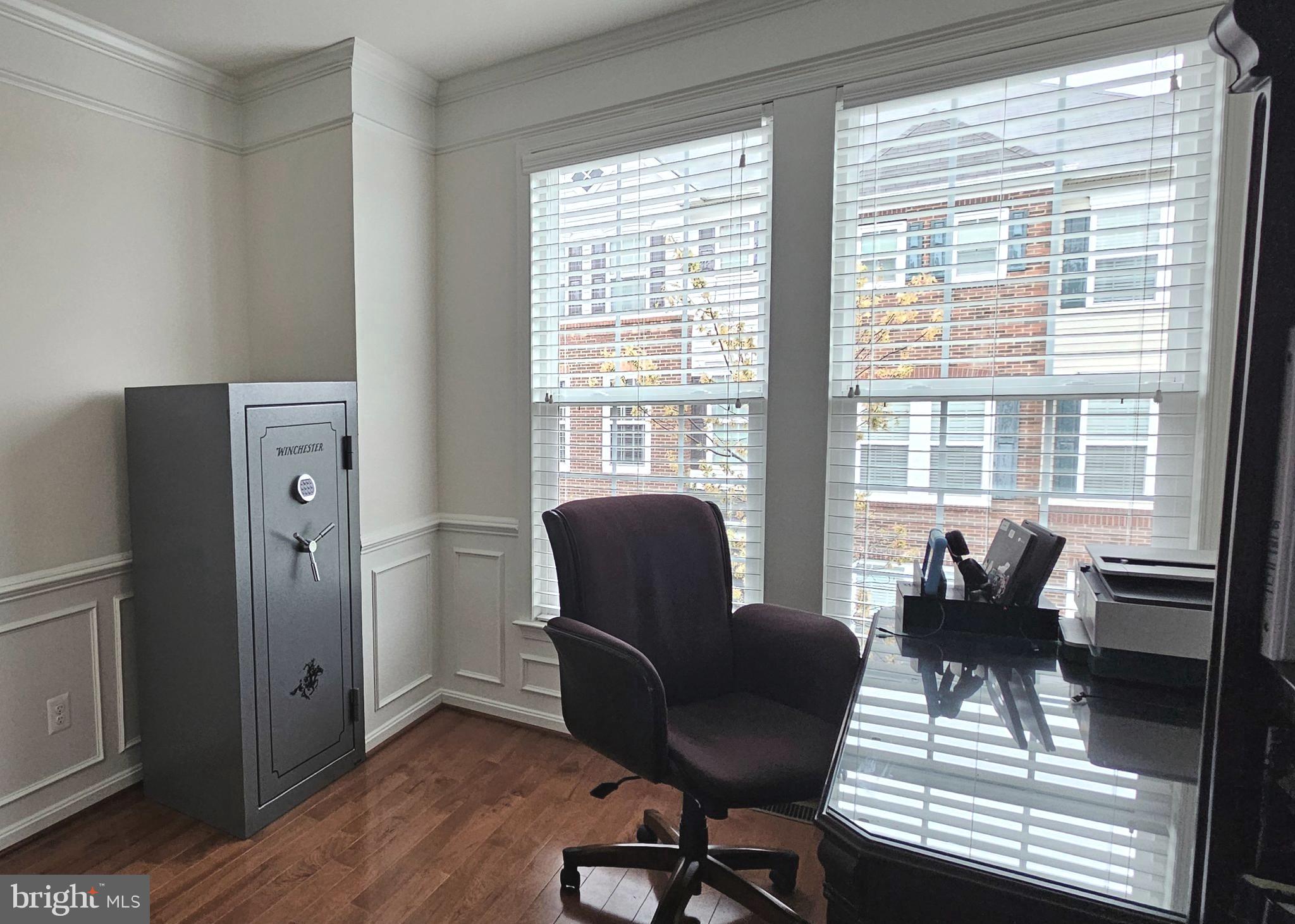 22629 Hawkbill Square Brambleton, VA 20148 - Photo 11 of 40 a living room with furniture and large windows