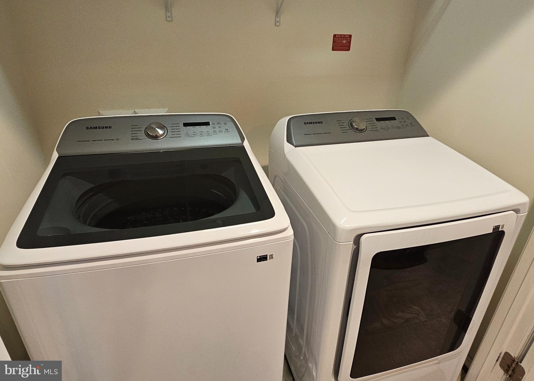 22629 Hawkbill Square Brambleton, VA 20148 - Photo 27 of 40 a utility room with dryer and washer