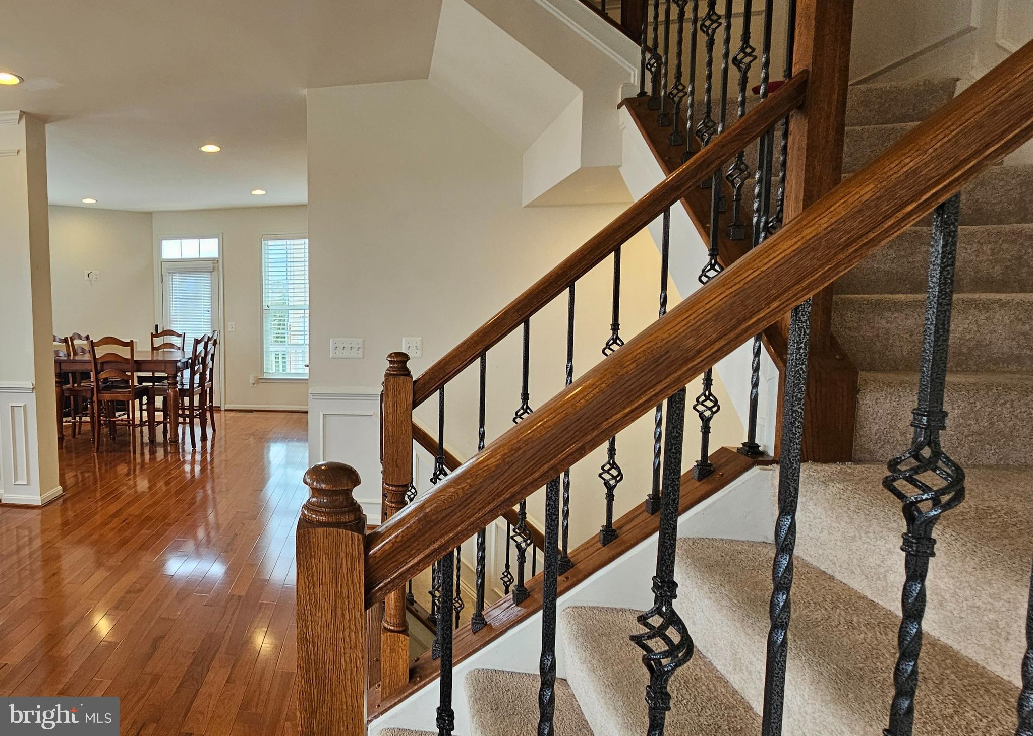 22629 Hawkbill Square Brambleton, VA 20148 - Photo 36 of 40 a view of entryway and hall with wooden floor
