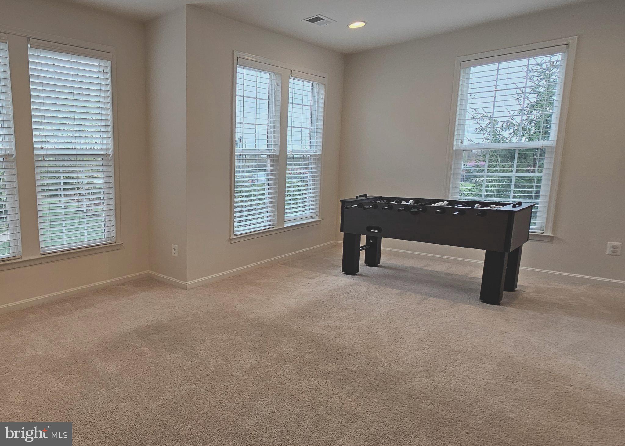 22629 Hawkbill Square Brambleton, VA 20148 - Photo 5 of 40 a view of an empty room with a window