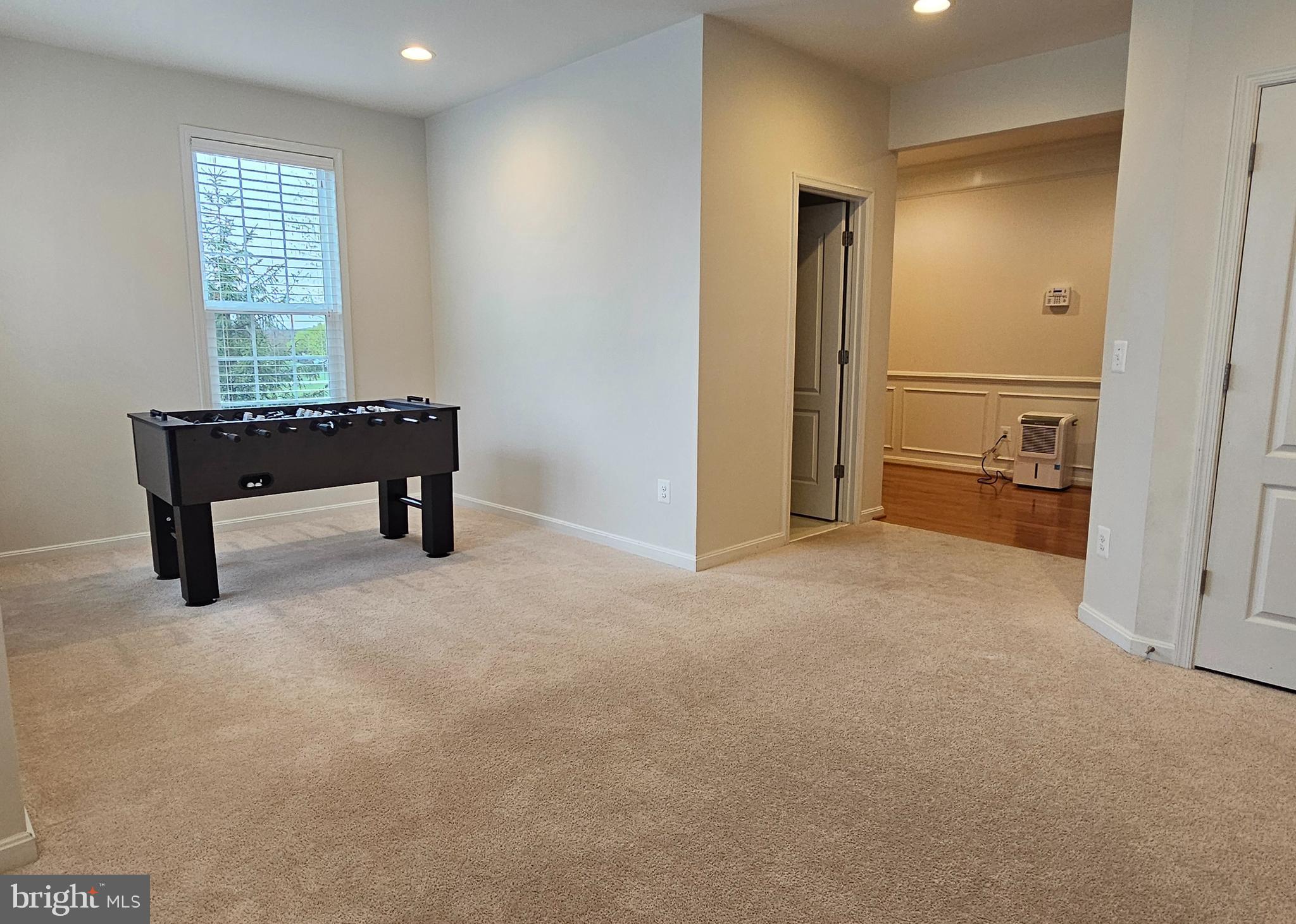 22629 Hawkbill Square Brambleton, VA 20148 - Photo 6 of 40 a view of room with furniture and windows
