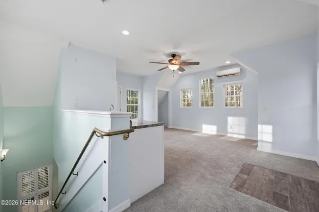 a view of livingroom and hardwood floor