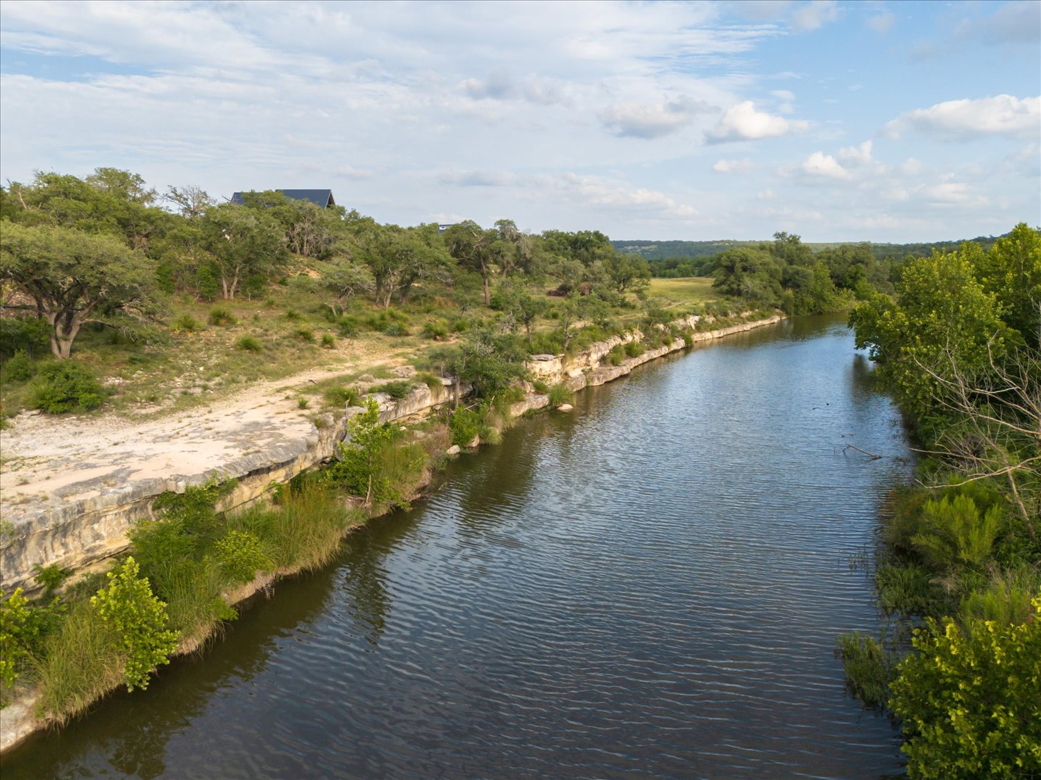 Lot 7 Byrd Ranch Road Johnson City, TX 78636 - Photo 18 of 25 a view of an ocean and beach