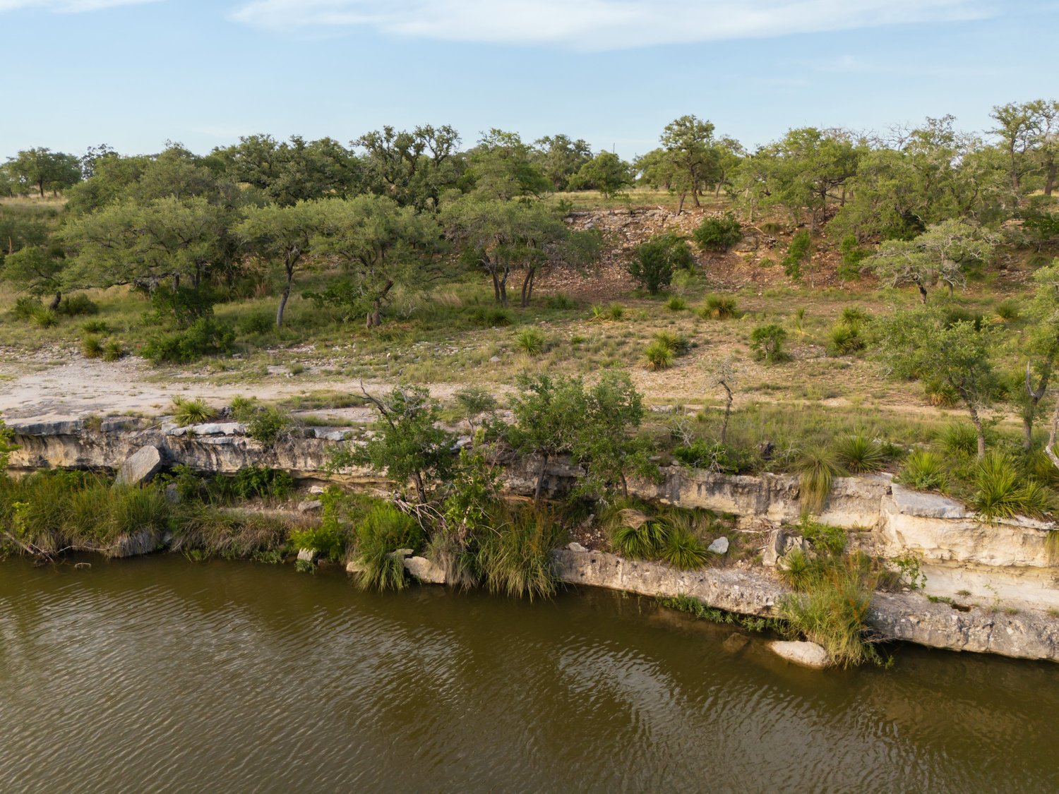 Lot 7 Byrd Ranch Road Johnson City, TX 78636 - Photo 2 of 25 a view of a lake