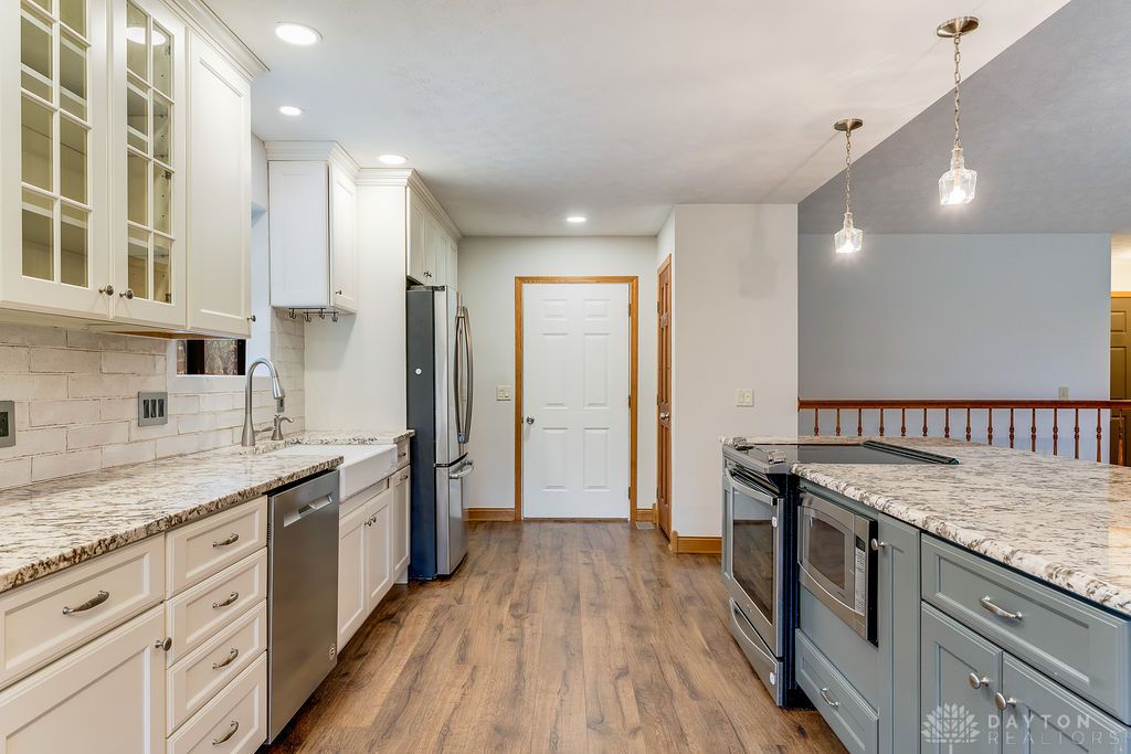 7400 Cook-Jones Road Waynesville, OH 45068 - Photo 37 of 72 This spacious kitchen offers ample countertop space and a functional layout for daily living.
