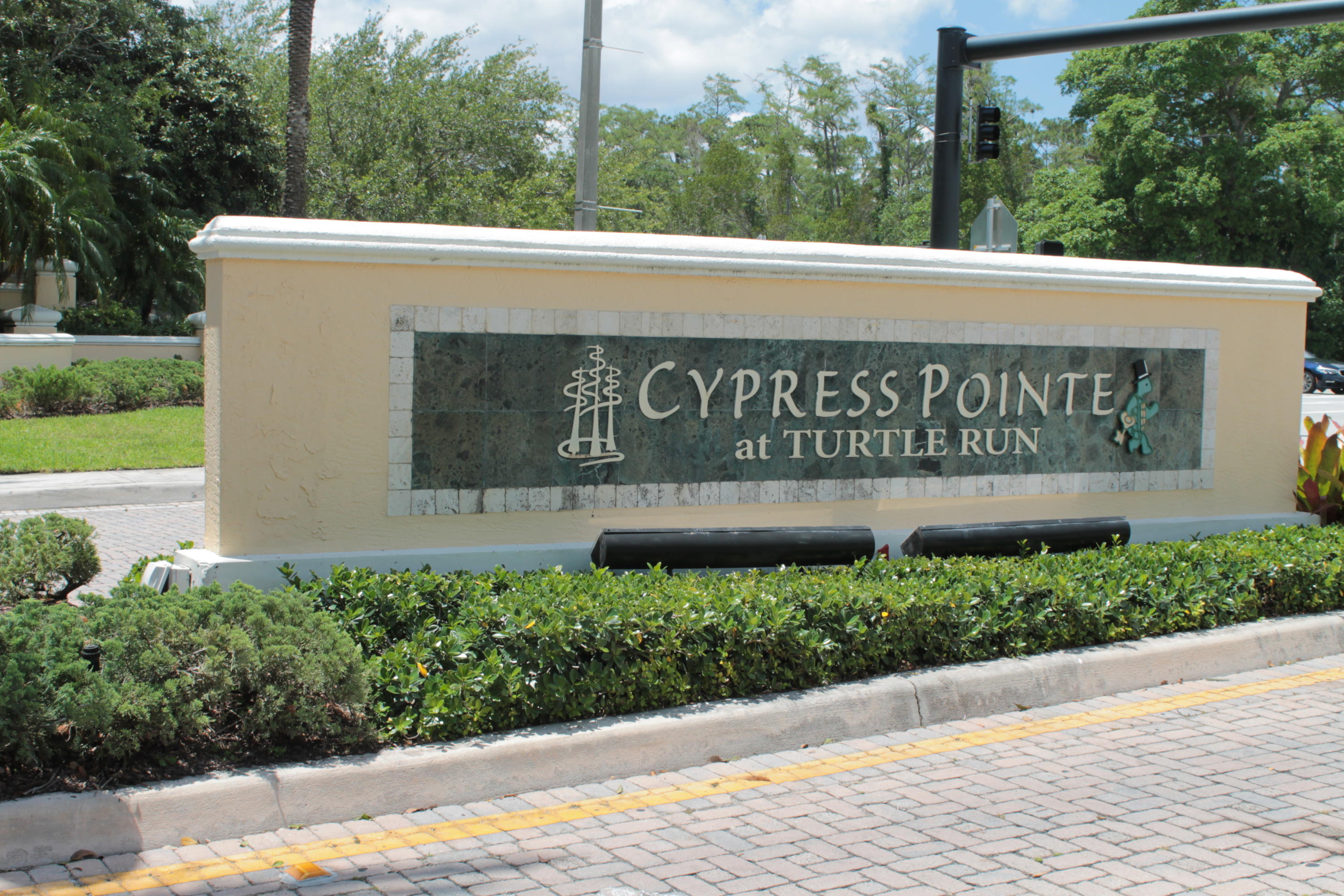 a view of a sign board with yard