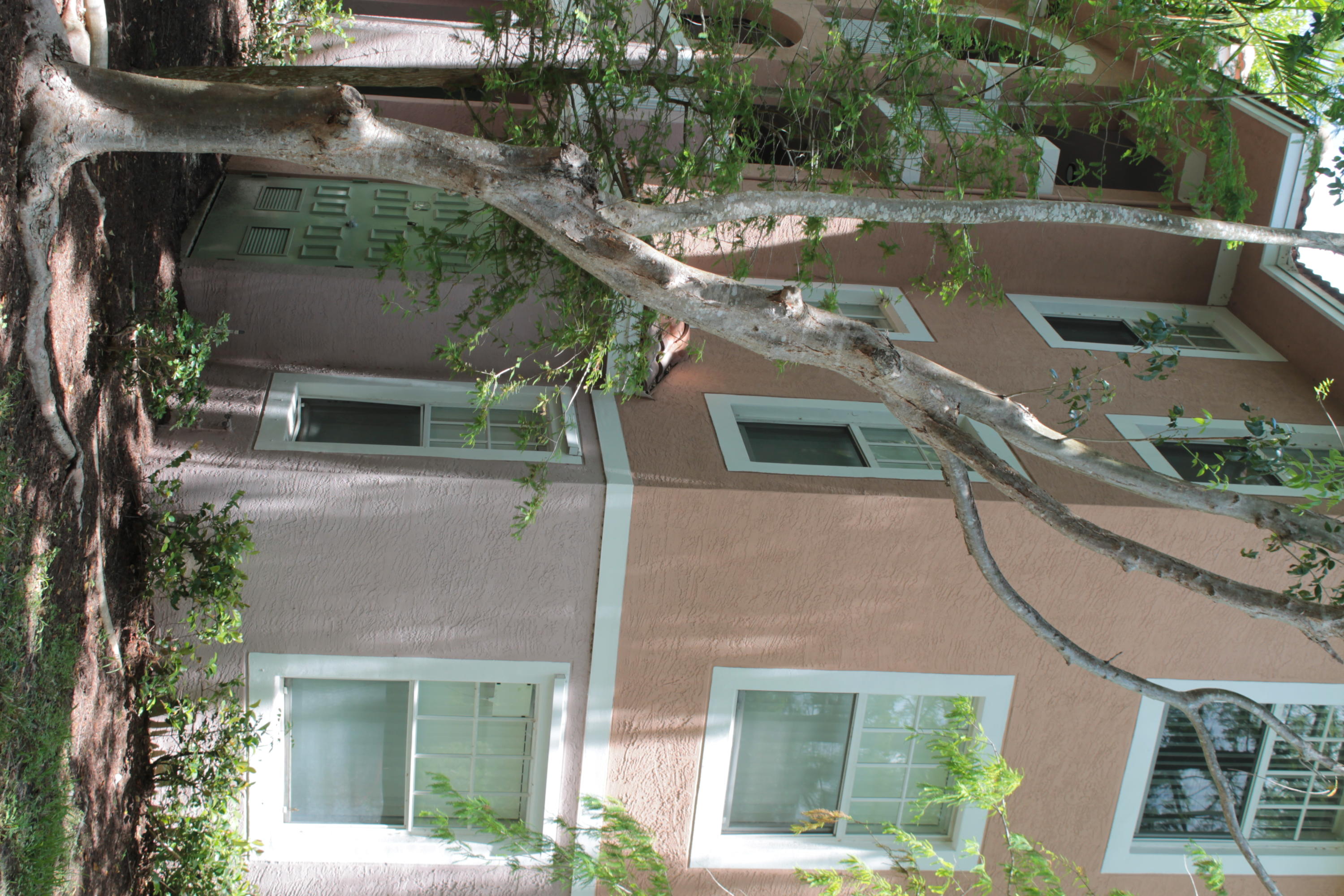 6682 West Sample Road, Unit 6682 Coral Springs, FL 33067 - Photo 9 of 9 a view of a house with a yard