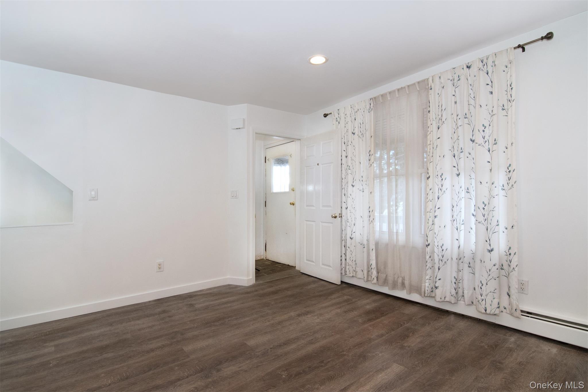 44 Ridge Street, Unit 1 Hastings-on-Hudson, NY 10706 - Photo 6 of 16 Entry with dark hardwood / wood-style floors