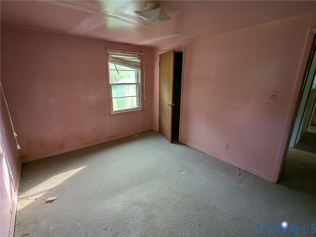 494 Reigel Road Emporia, VA 23847 - Photo 11 of 26 an empty room with windows