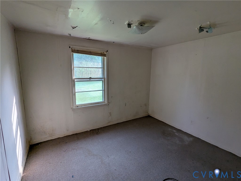 494 Reigel Road Emporia, VA 23847 - Photo 13 of 26 a view of an empty room with a window