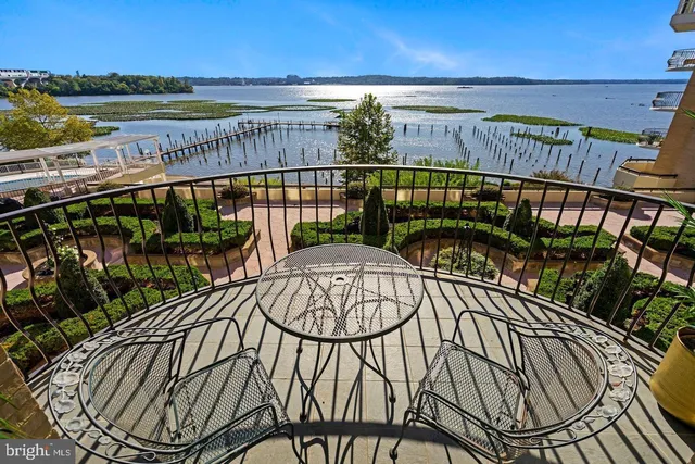 a view of balcony with furniture