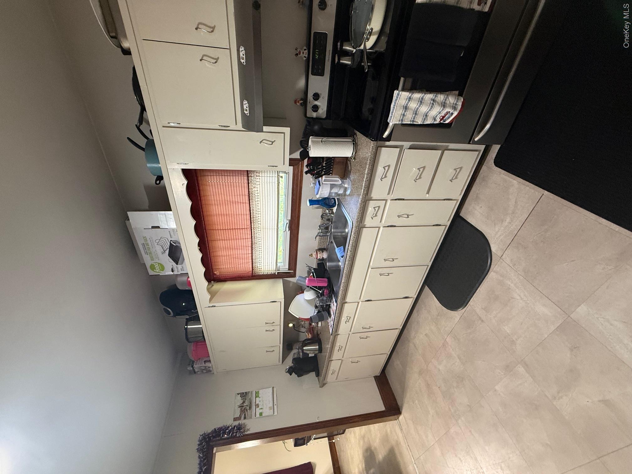 81 Kisor Road Highland, NY 12528 - Photo 5 of 17 a kitchen with stainless steel appliances granite countertop a sink stove and cabinets