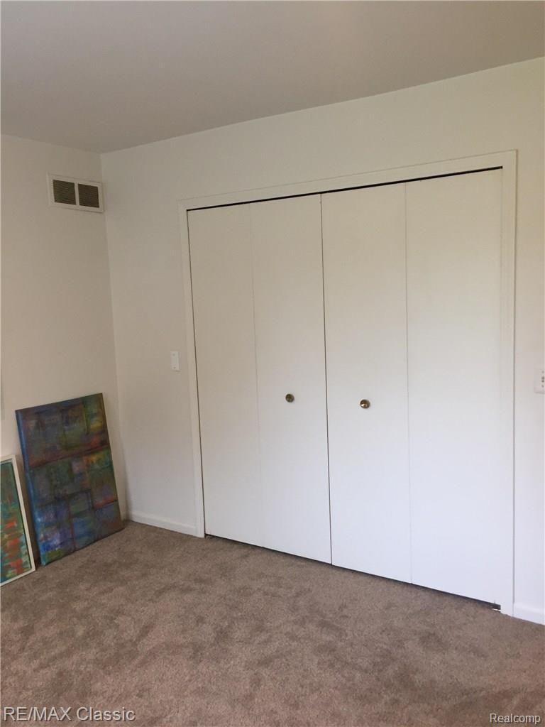 29652 Middlebelt Road, Unit 2402 Farmington, MI 48334 - Photo 21 of 26 BEDROOM 2 DOUBLE CLOSETS