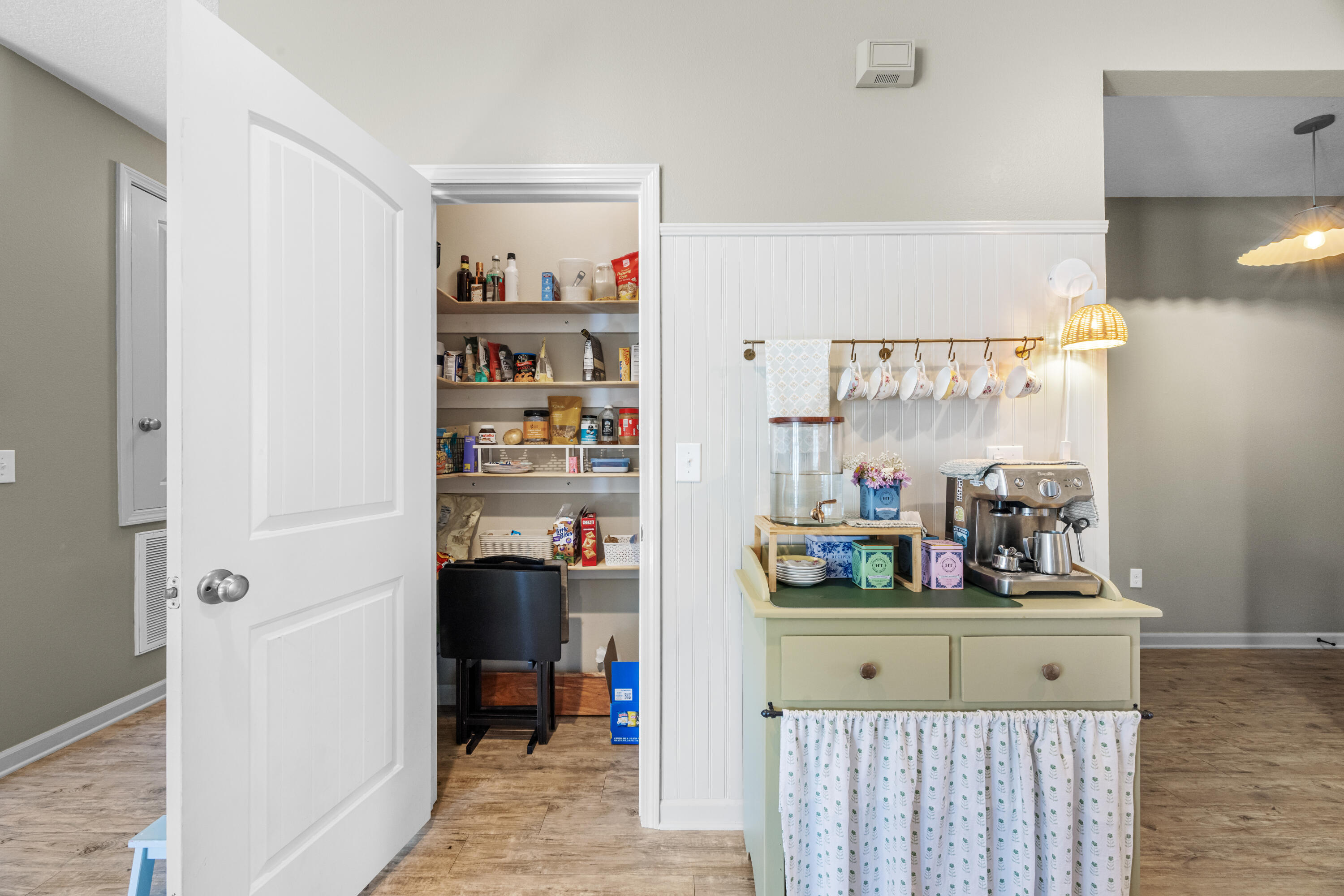 110 Cornelia Street Freeport, FL 32439 - Photo 13 of 60 a room with a book shelf and a shelf with shelf