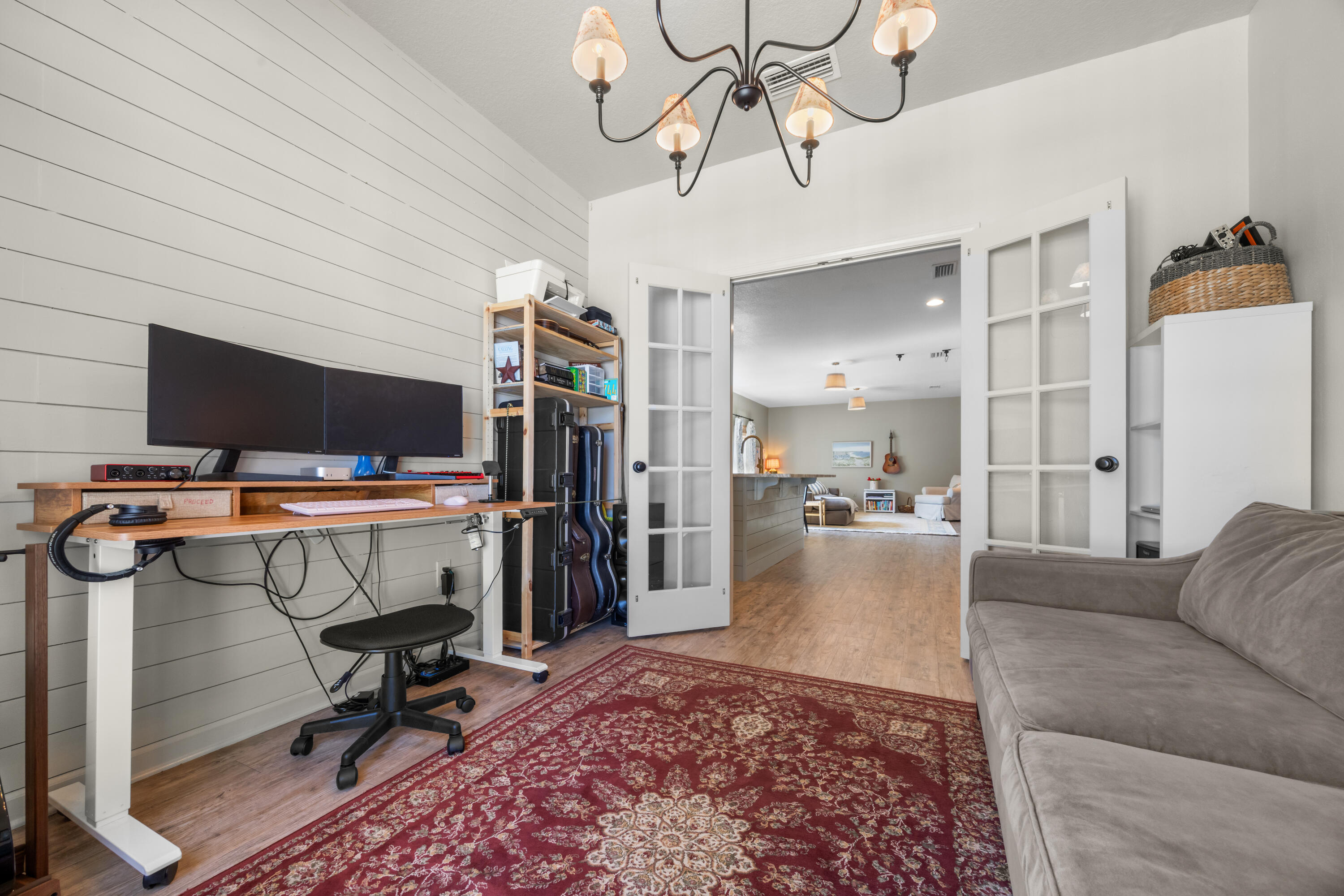 110 Cornelia Street Freeport, FL 32439 - Photo 18 of 60 a view of a livingroom with workspace and a couch