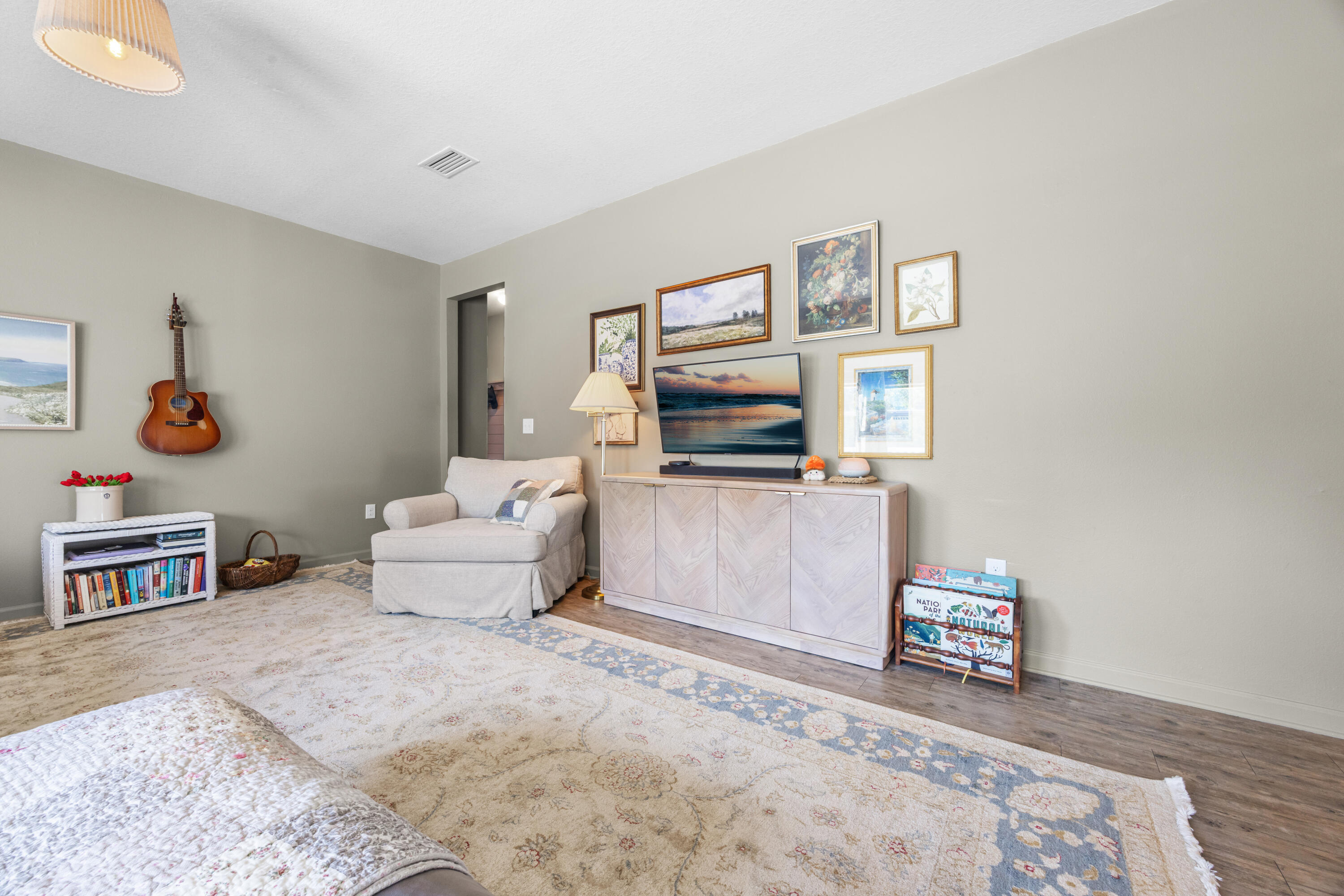 110 Cornelia Street Freeport, FL 32439 - Photo 21 of 60 a living room with furniture and a flat screen tv