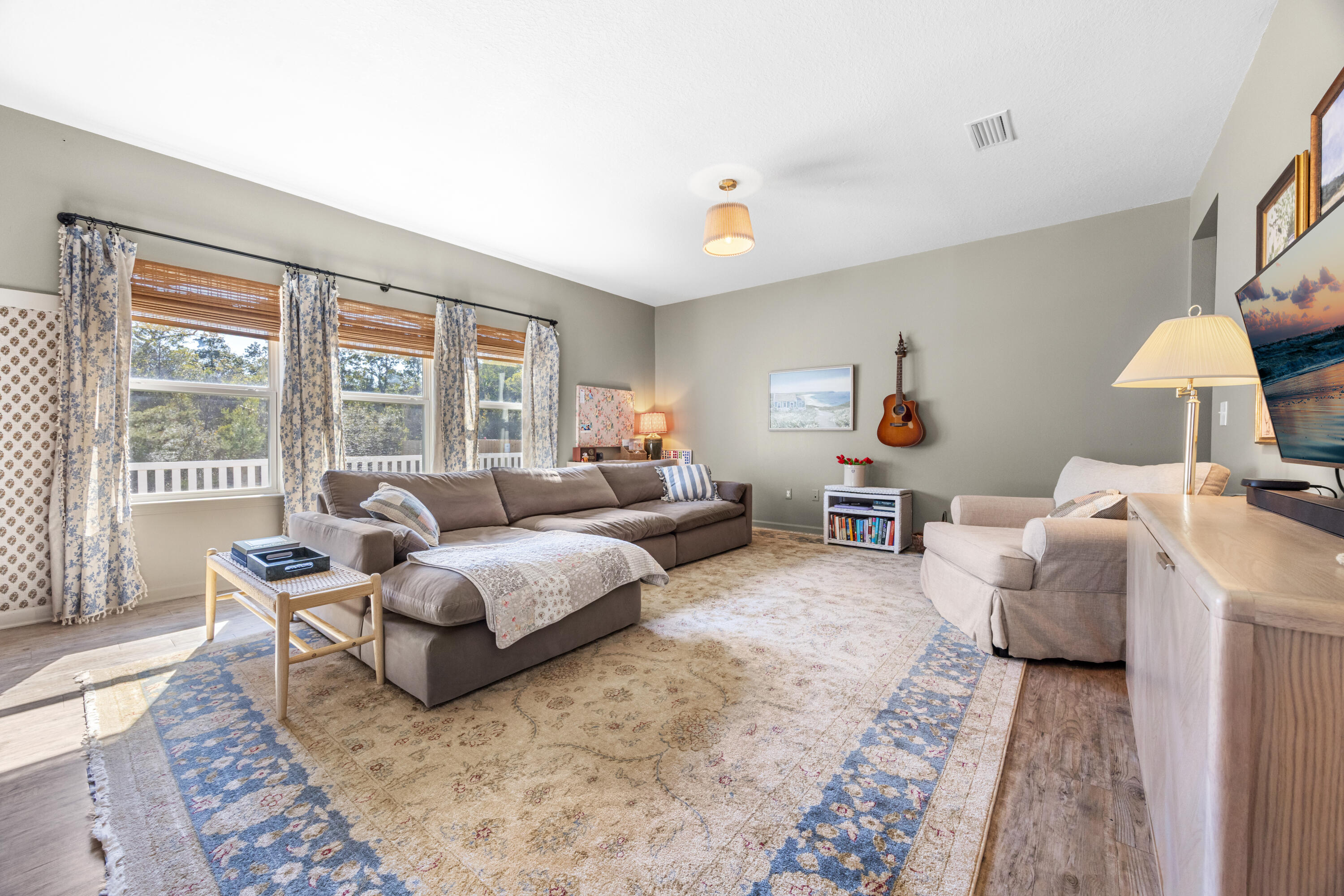 110 Cornelia Street Freeport, FL 32439 - Photo 22 of 60 a bedroom with furniture and a large window