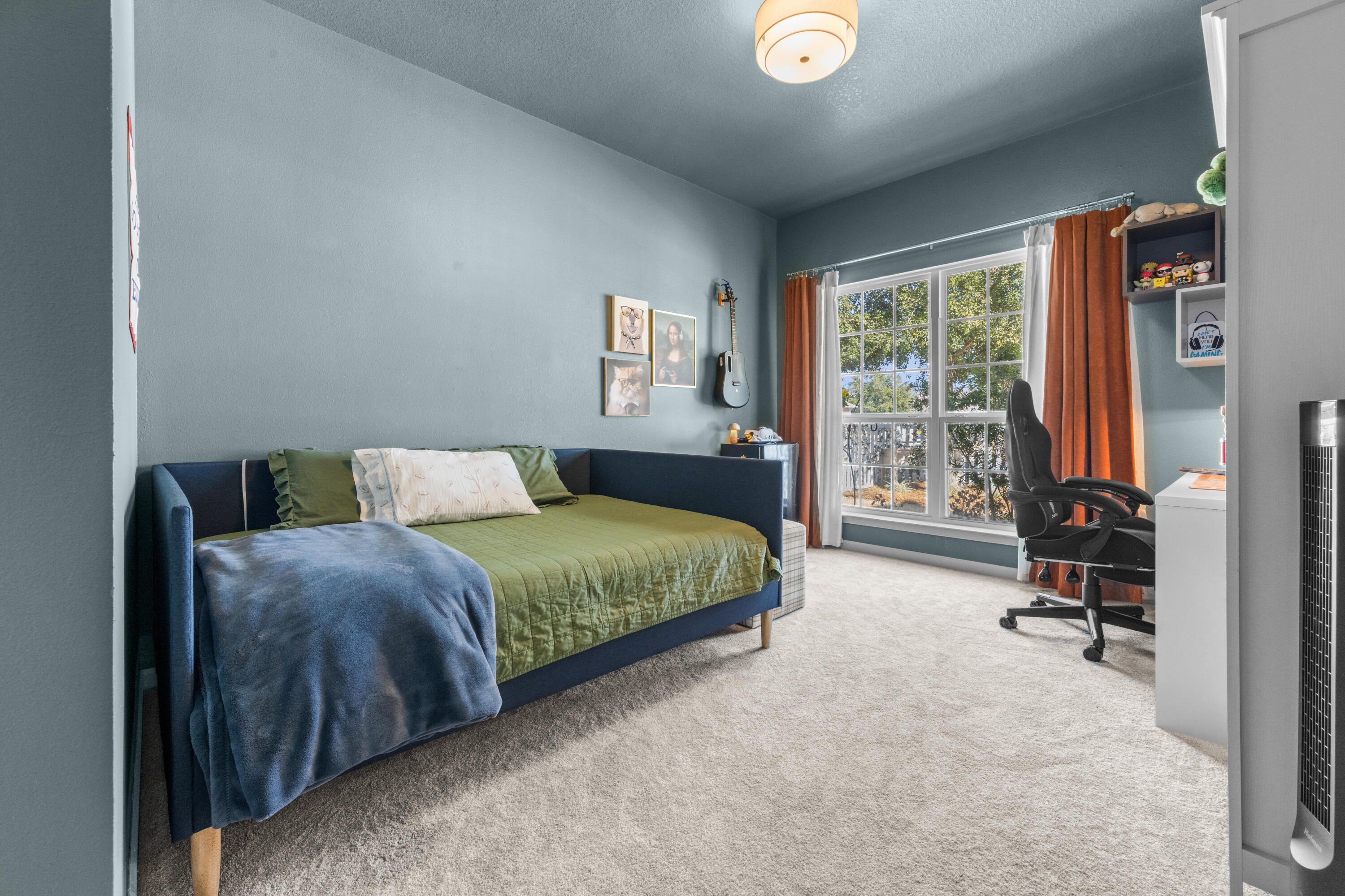 110 Cornelia Street Freeport, FL 32439 - Photo 31 of 60 a spacious bedroom with a bed and chair