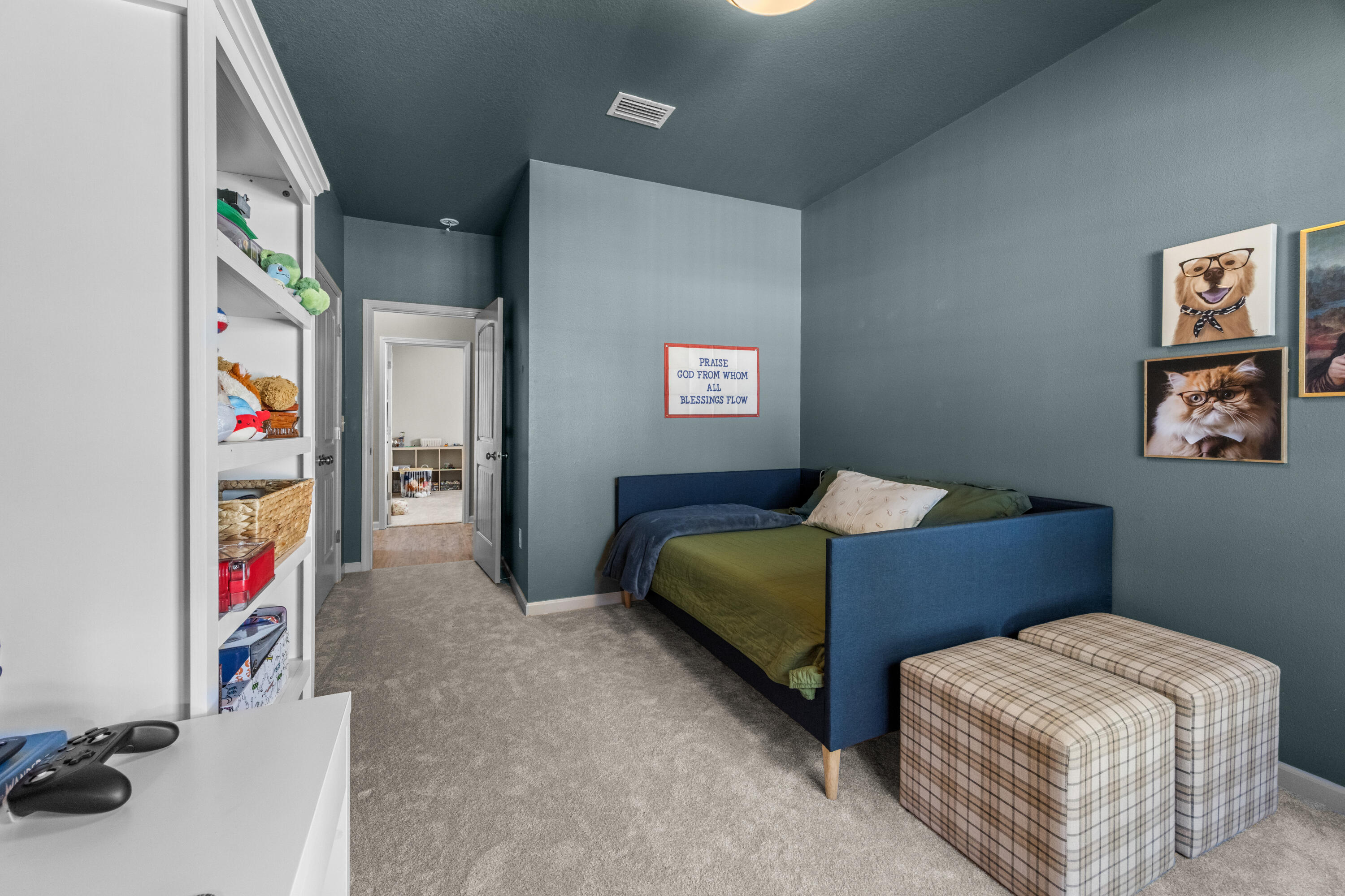 110 Cornelia Street Freeport, FL 32439 - Photo 33 of 60 a bedroom with bed and a couch