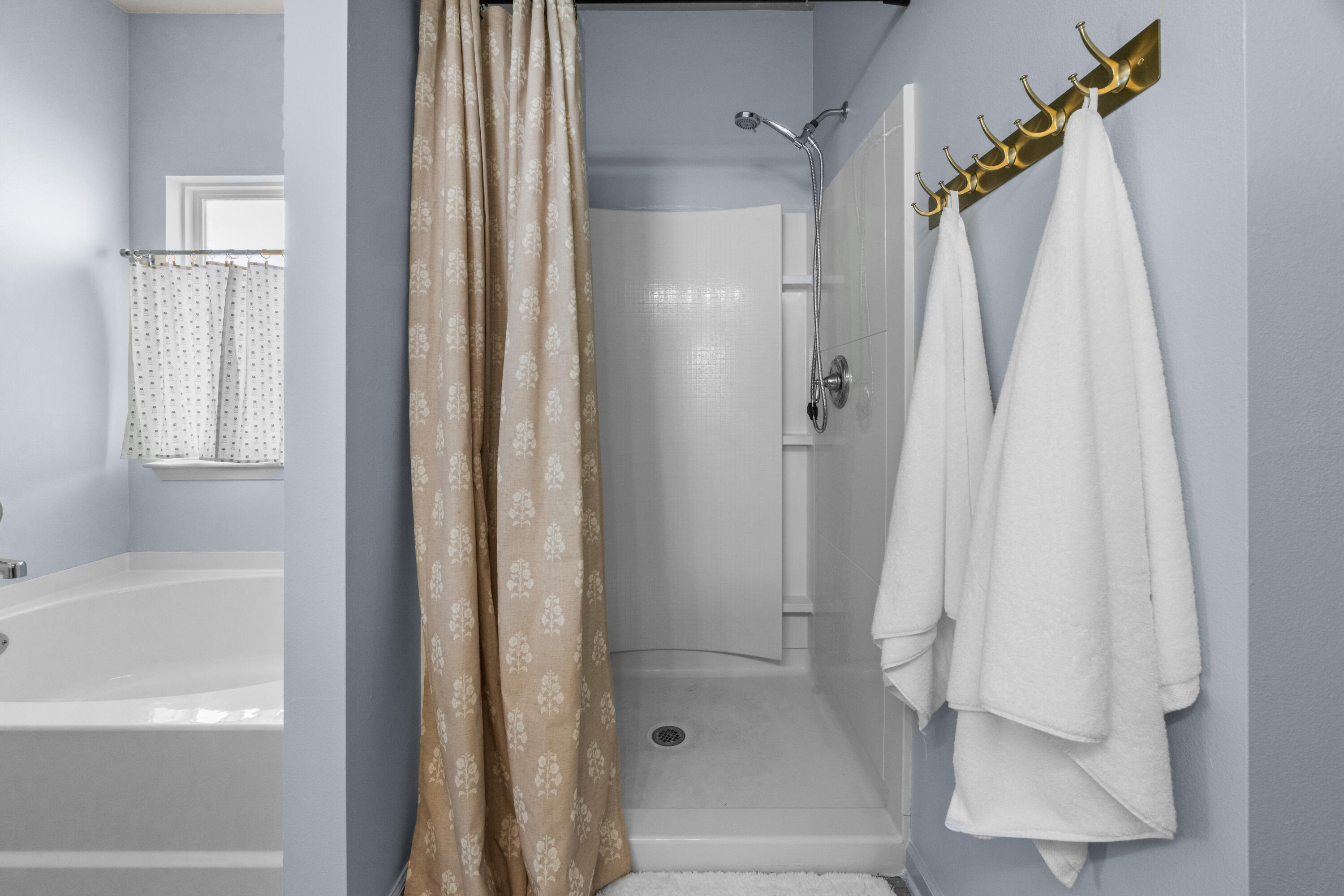 110 Cornelia Street Freeport, FL 32439 - Photo 41 of 60 a bathroom with a shower and a tub