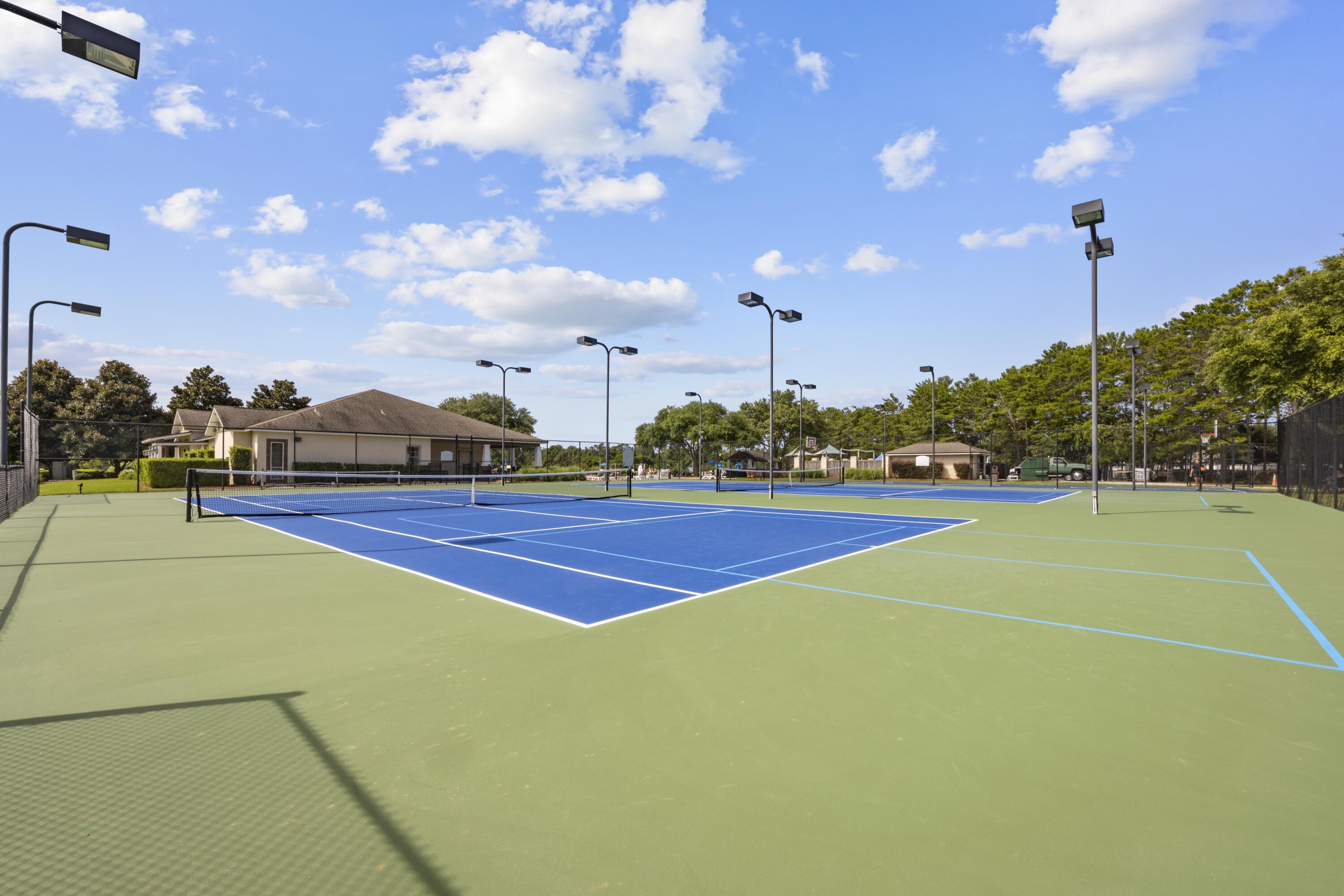 110 Cornelia Street Freeport, FL 32439 - Photo 46 of 60 a view of an outdoor space and tennis court
