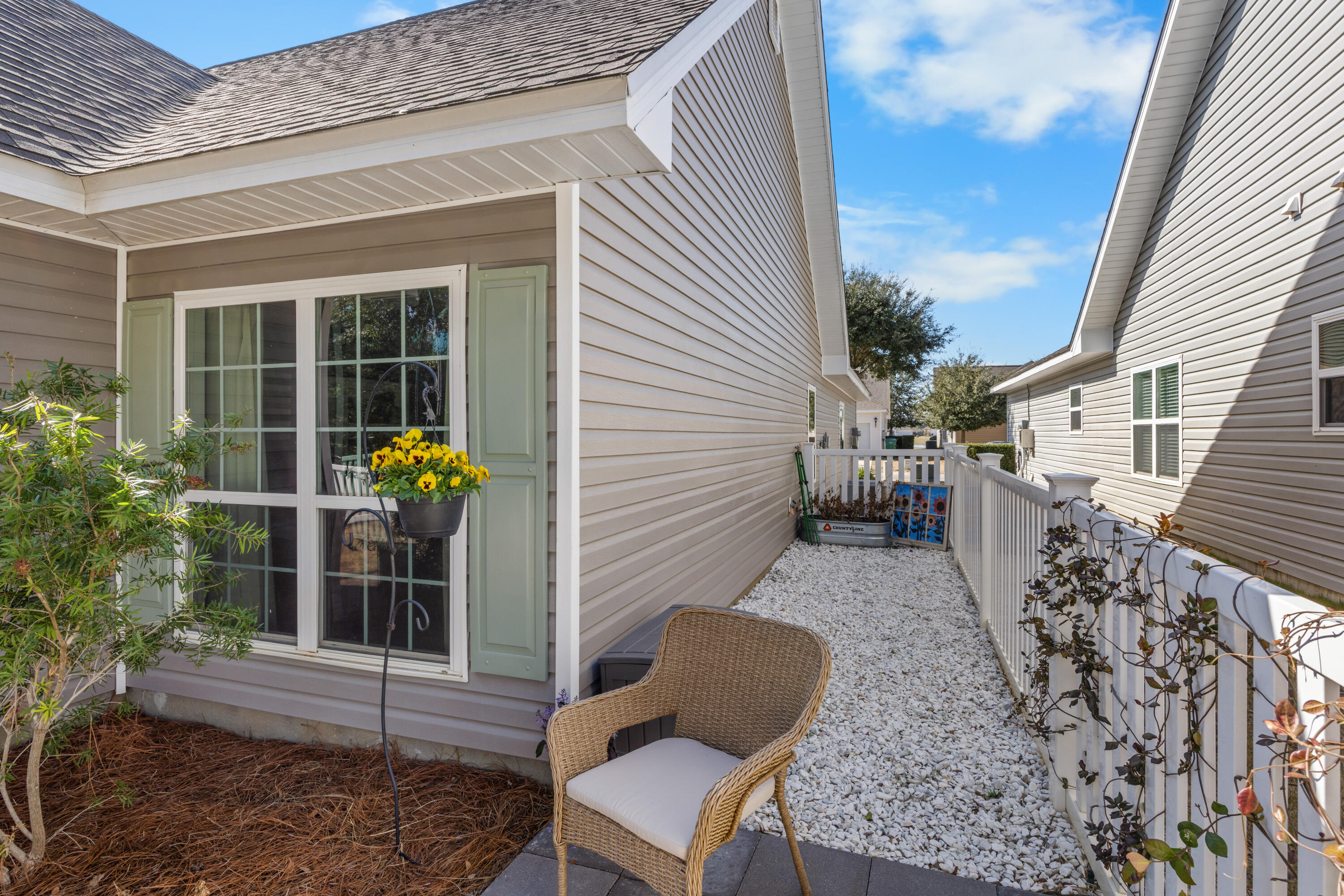 110 Cornelia Street Freeport, FL 32439 - Photo 5 of 60 a view of a house with backyard and sitting area