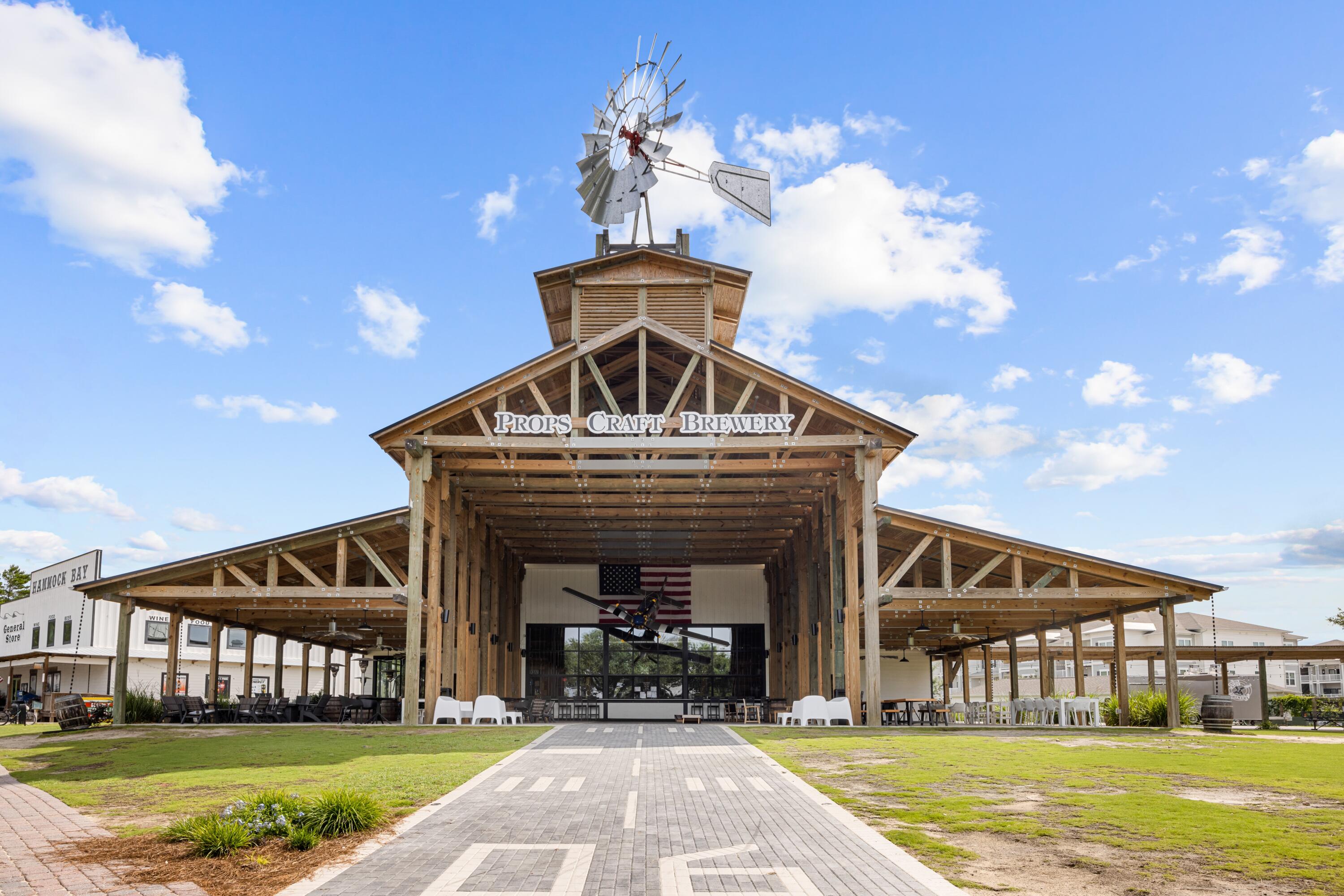 110 Cornelia Street Freeport, FL 32439 - Photo 53 of 60 a front view of a house with garden