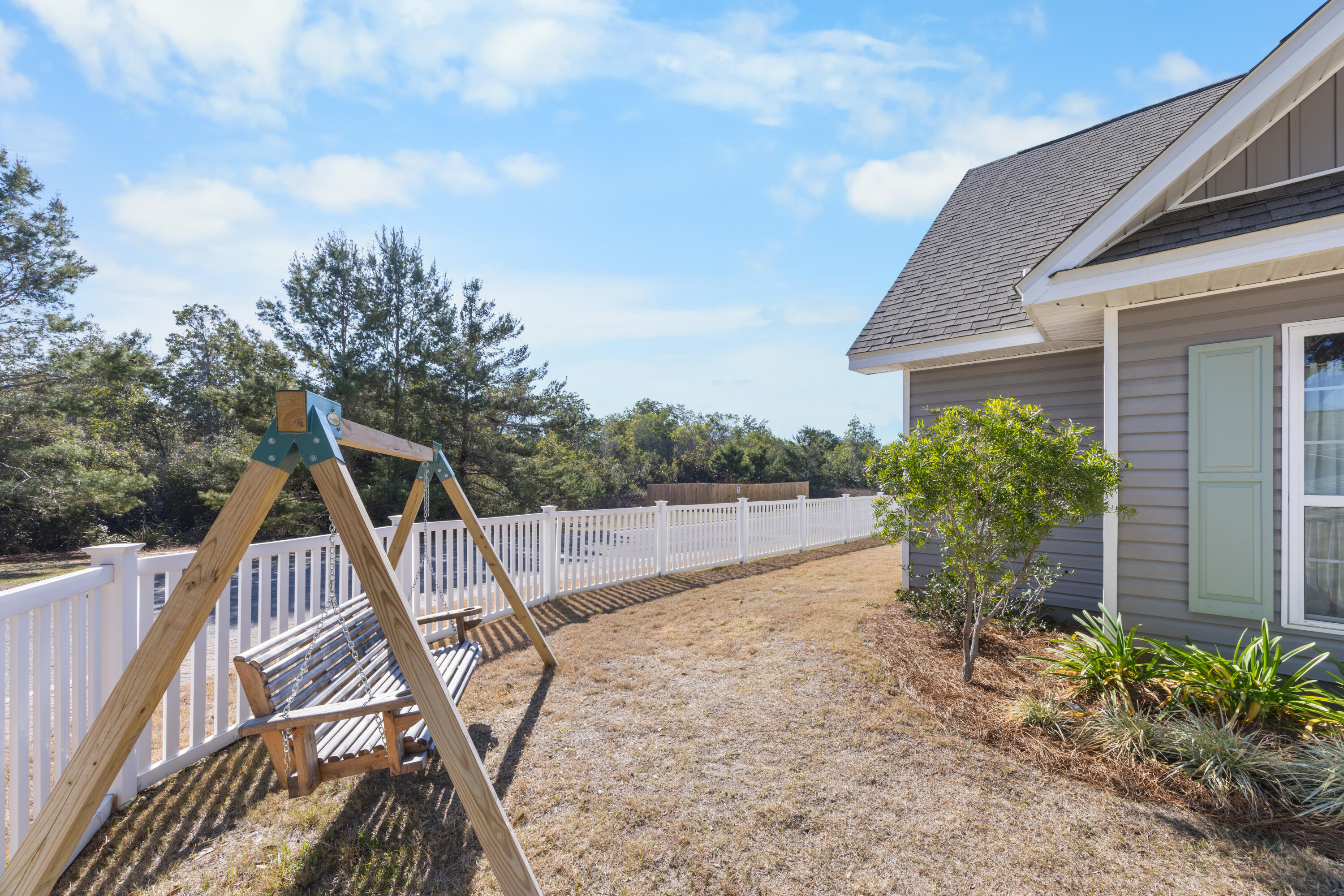110 Cornelia Street Freeport, FL 32439 - Photo 7 of 60 a view of a backyard with sitting area